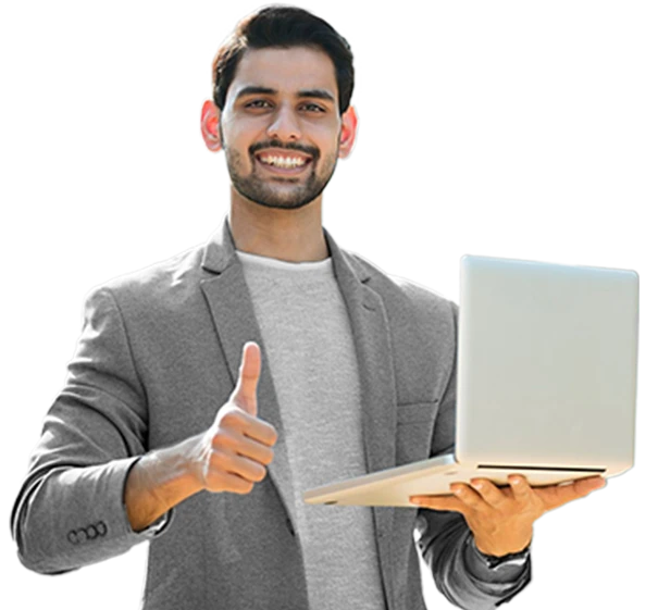 Smilling man in grey blazer holding a laptop and giving a thumbs-up gesture against a black background