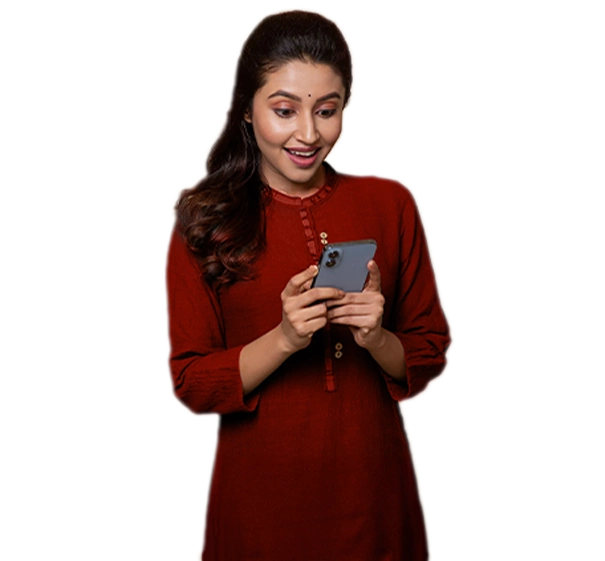 Woman in maroon top looking at her smartphone against an orange background