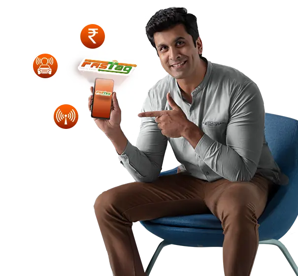 Man pointing to a mobile phone displaying FASTag on an ICICI Bank webpage promoting online FASTag purchases.