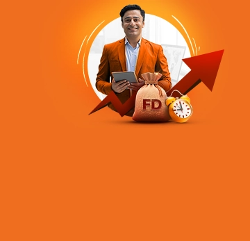 Happy couple holding new house keys and a model home, symbolizing home loan success.