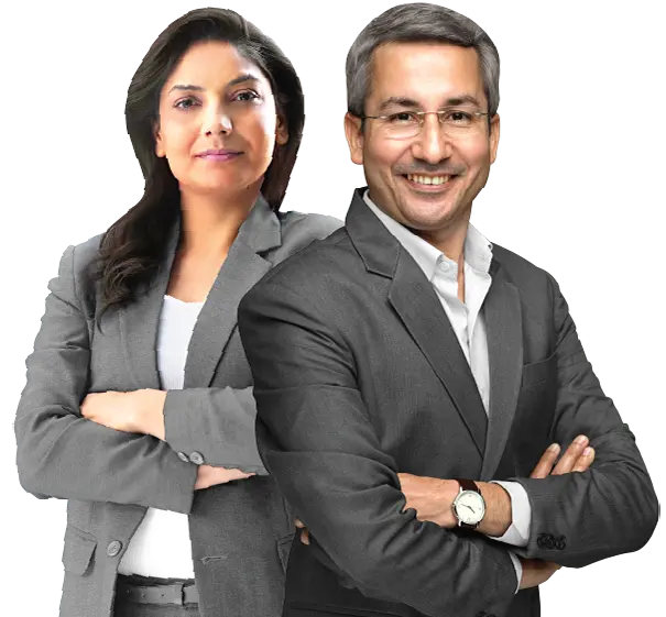 Smiling professional couple posing confidently, symbolizing trust and planning.