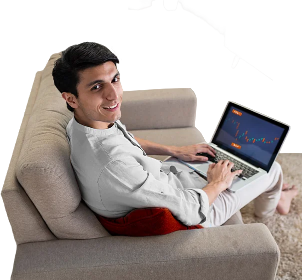 Man relaxing on a sofa using a laptop for online banking.